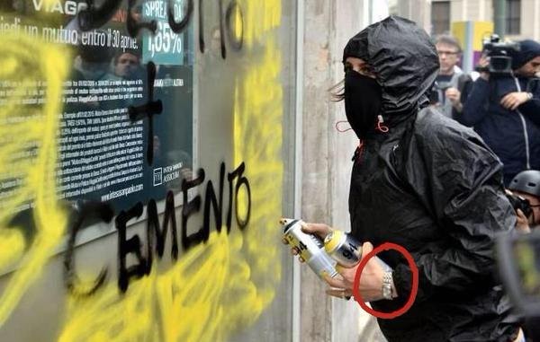 Devastazioni Black bloc con il Rolex al polso?