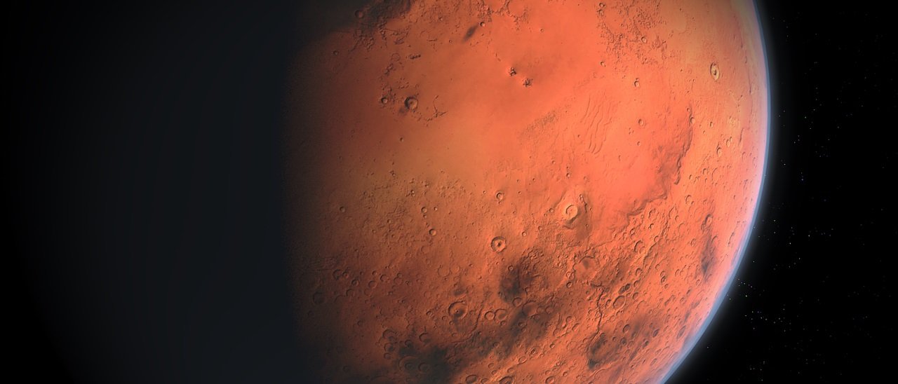 Marte, cratere tinge la superficie di blu e nero